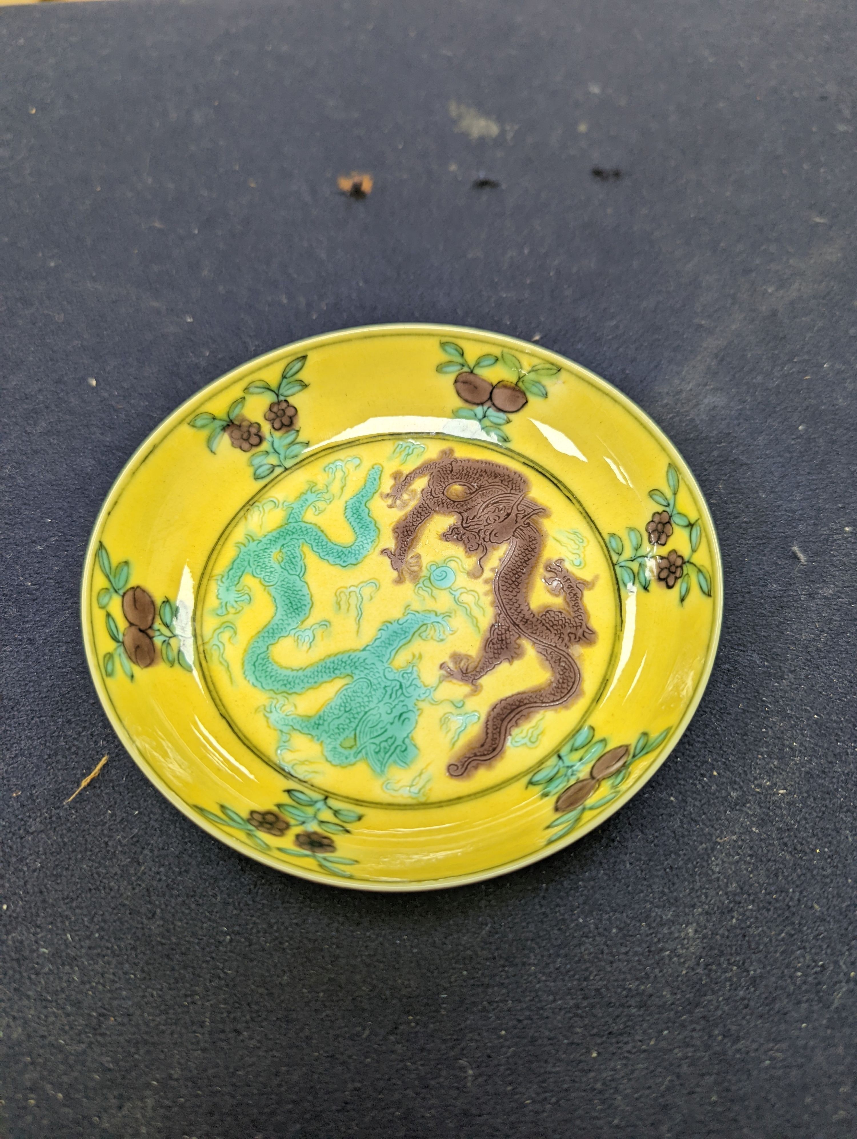 A pair of Chinese yellow, green and aubergine dragon dishes, Guangxu marks, 10cm.